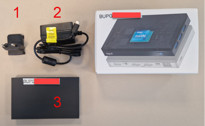 The mini computer with plug and power cable