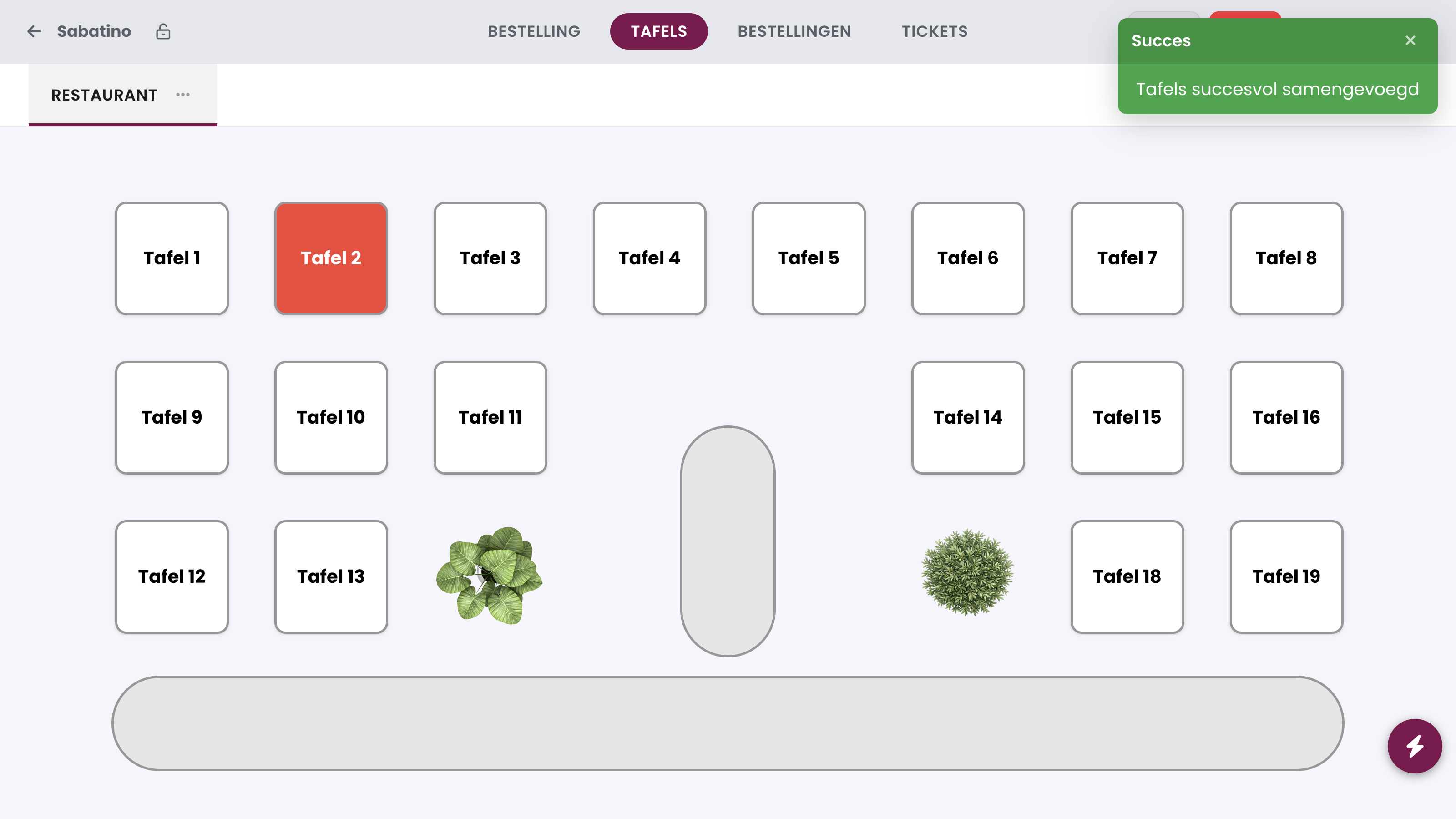 The message Tables merged successfully: everything is now on Table 2 and Table 1 is free.